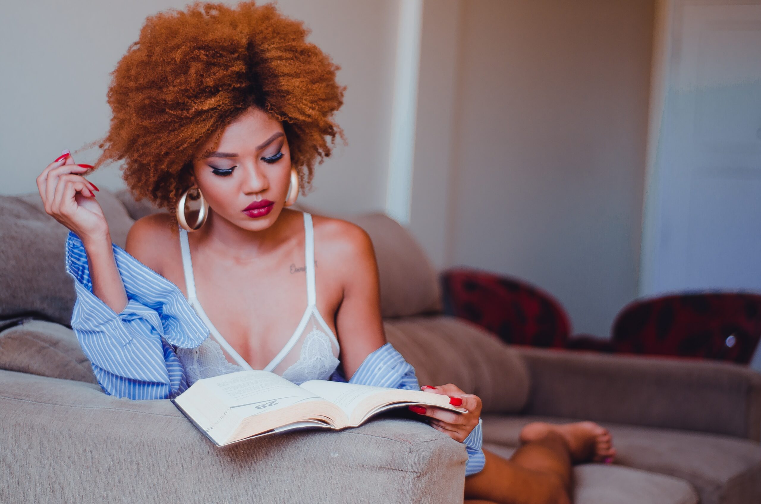Woman reading - Black Love 5 Ways to Commit to Self Care in 2019