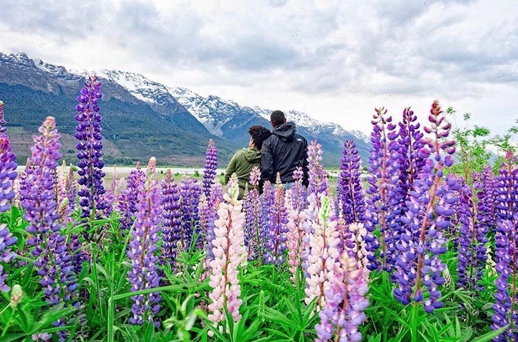 Couple standing in field - Black Love Top 9 Unique Date Ideas