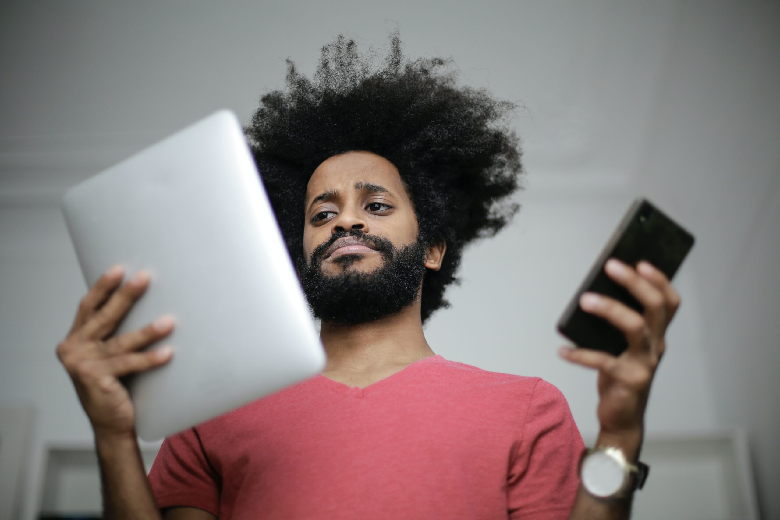 man-in-red-crew-neck-shirt-holding-white-tablet-computer-and-3965248 - Black Love Courtesy of Pexels.com