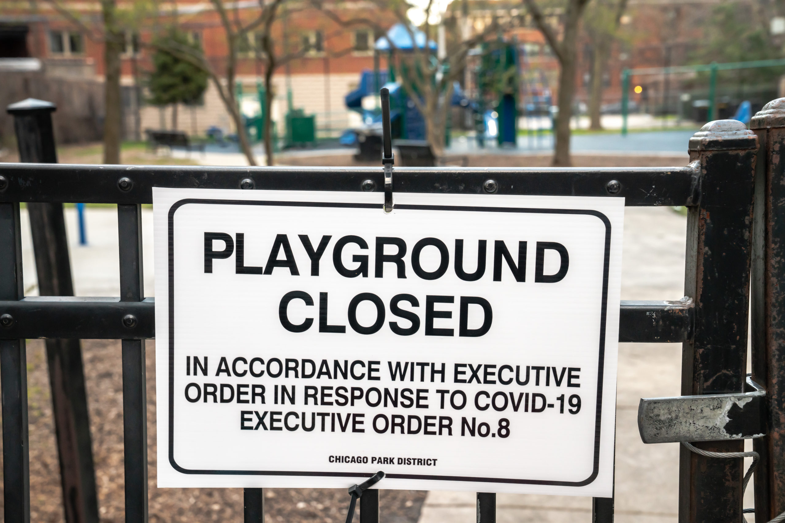 A closed sign hangs on a playground fence in the Edgewater neighborhood on a Chicago Park District Park due to COVID-19 executive orders. (Photo courtesy of Shutterstock) - Black Love Ways to Balance Your Mind, Body and Soul During Social Distancing