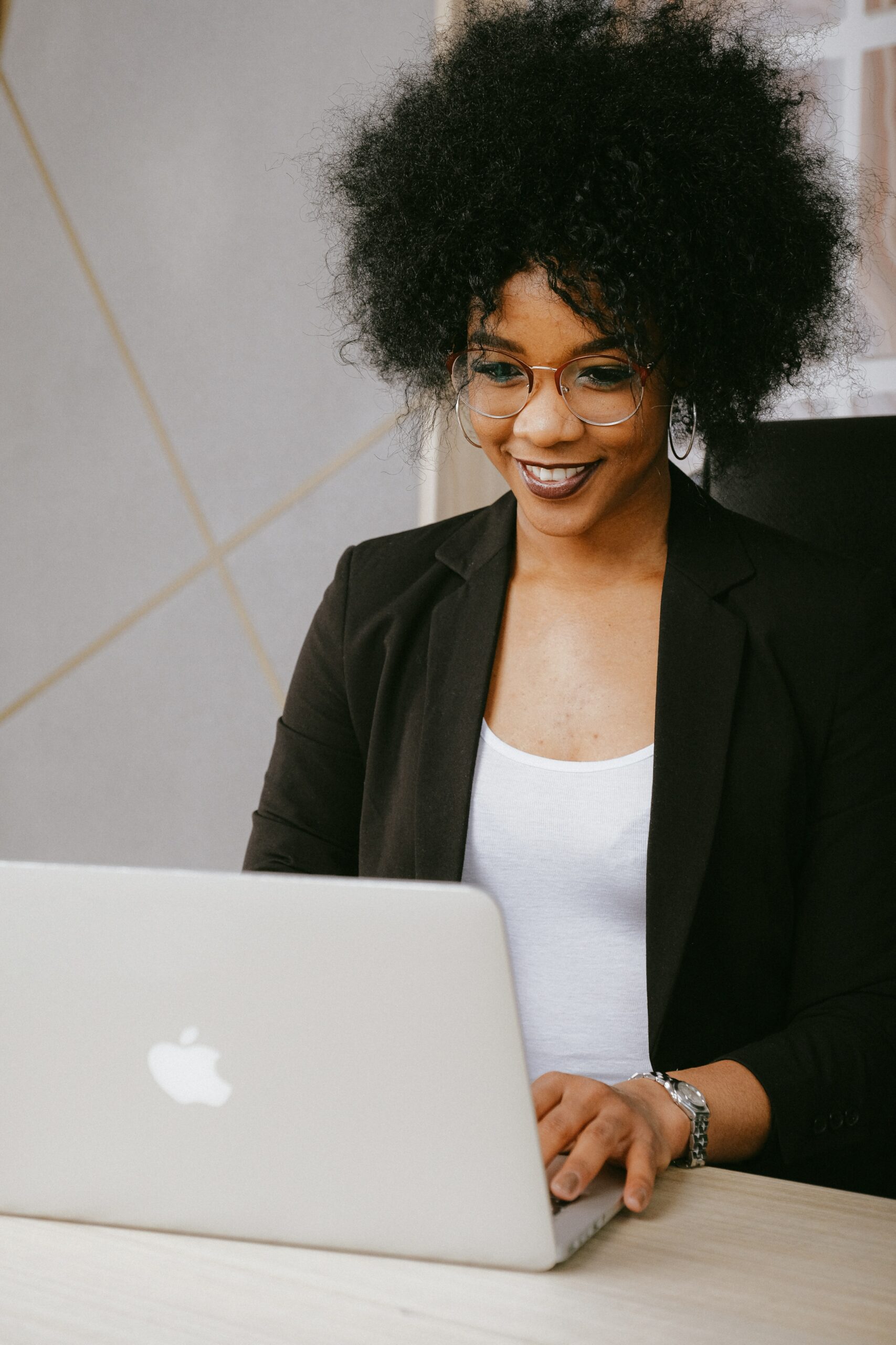 Woman on laptop - Black Love 5 Ways to Leverage Your Business During Quarantine