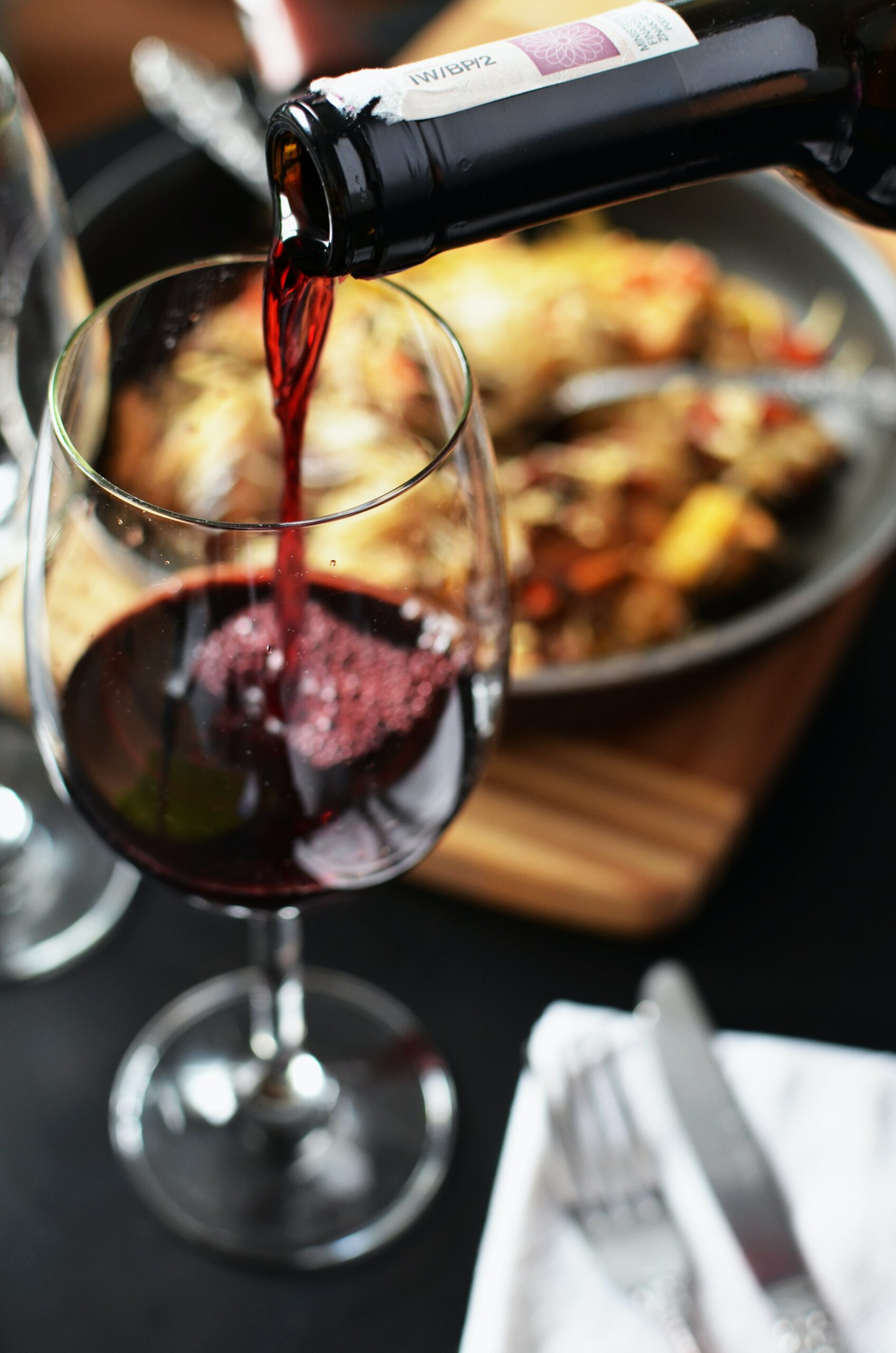 Red wine with food. (Photo courtesy of Pexels.com) - Black Love Red wine with food. (Photo courtesy of Pexels.com)