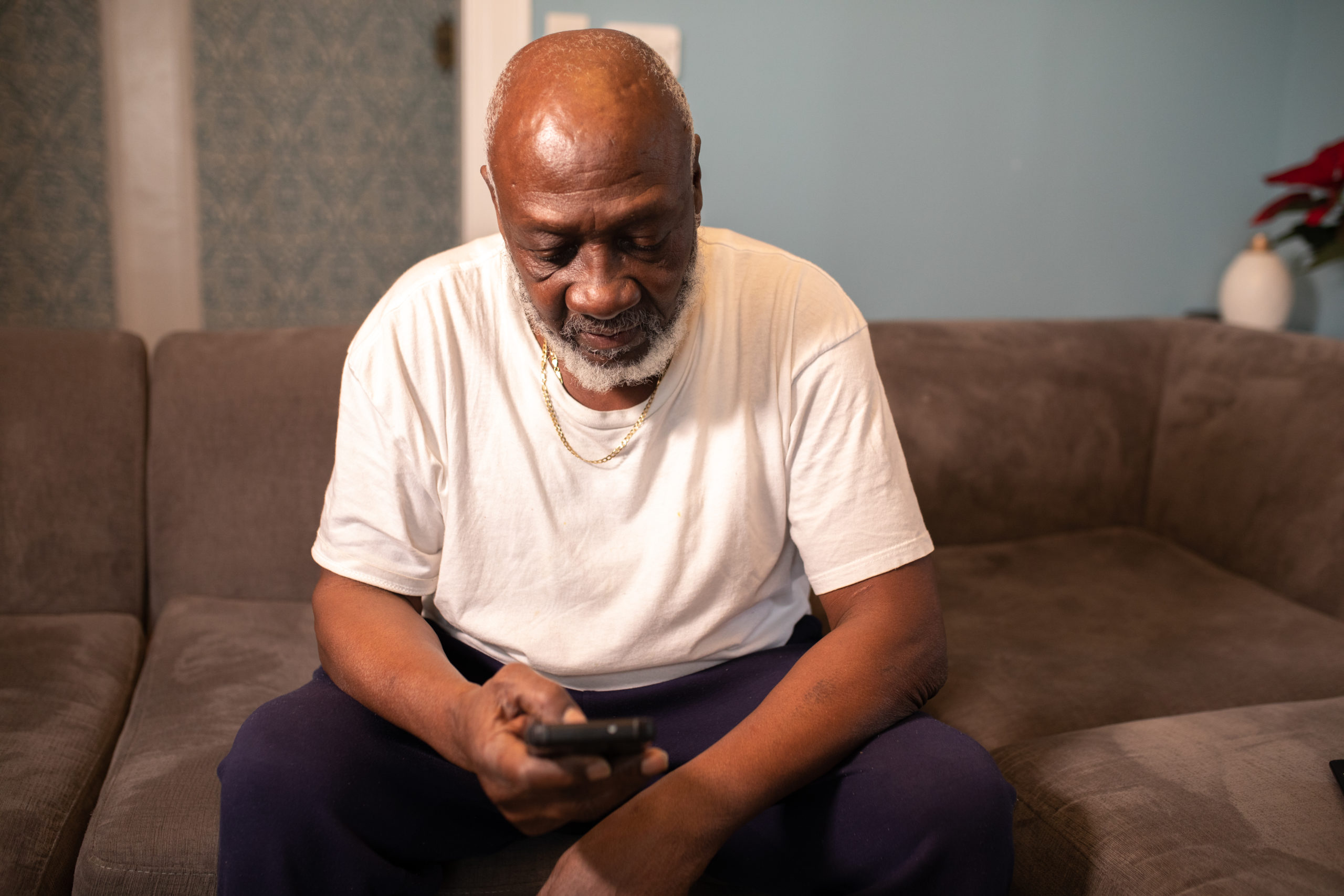 Man on phone (Phone courtesy of Nappy.co) - Black Love Man on phone (Phone courtesy of Nappy.co)
