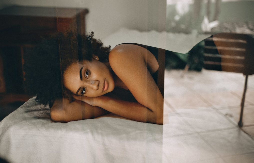 Woman laying in bed (Photo courtesy of Pexels.com) - Black Love Woman laying in bed (Photo courtesy of Pexels.com)