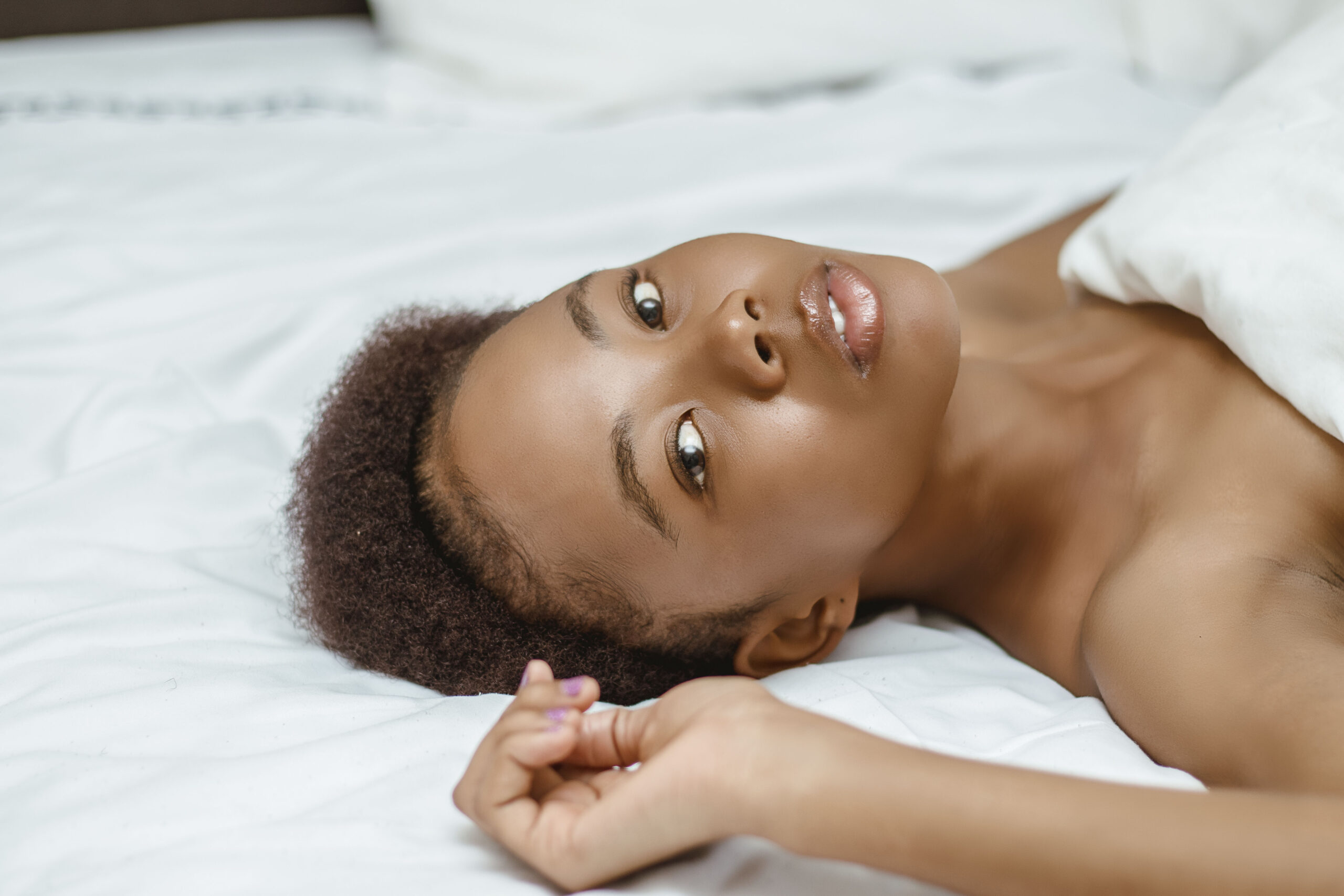 Courtesy of Pexels.com - Black Love Woman lying on bed (Photo courtesy of Pexels.com)