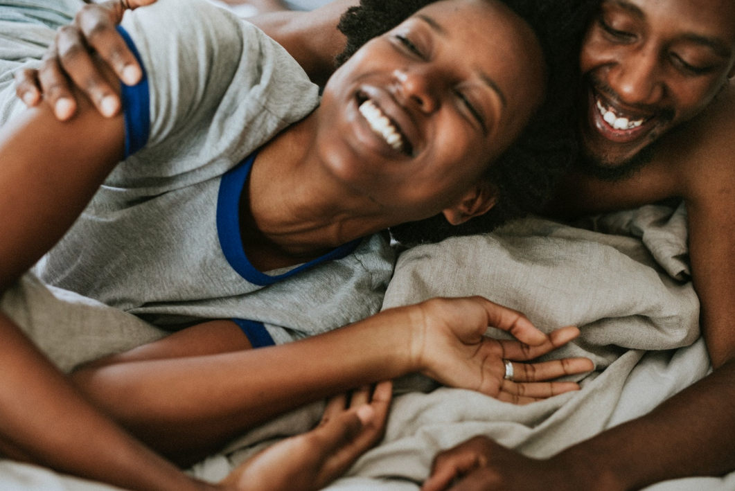 Couple laughing (Photo courtesy of rawpixel.com) - Black Love Couple laughing (Photo courtesy of rawpixel.com)