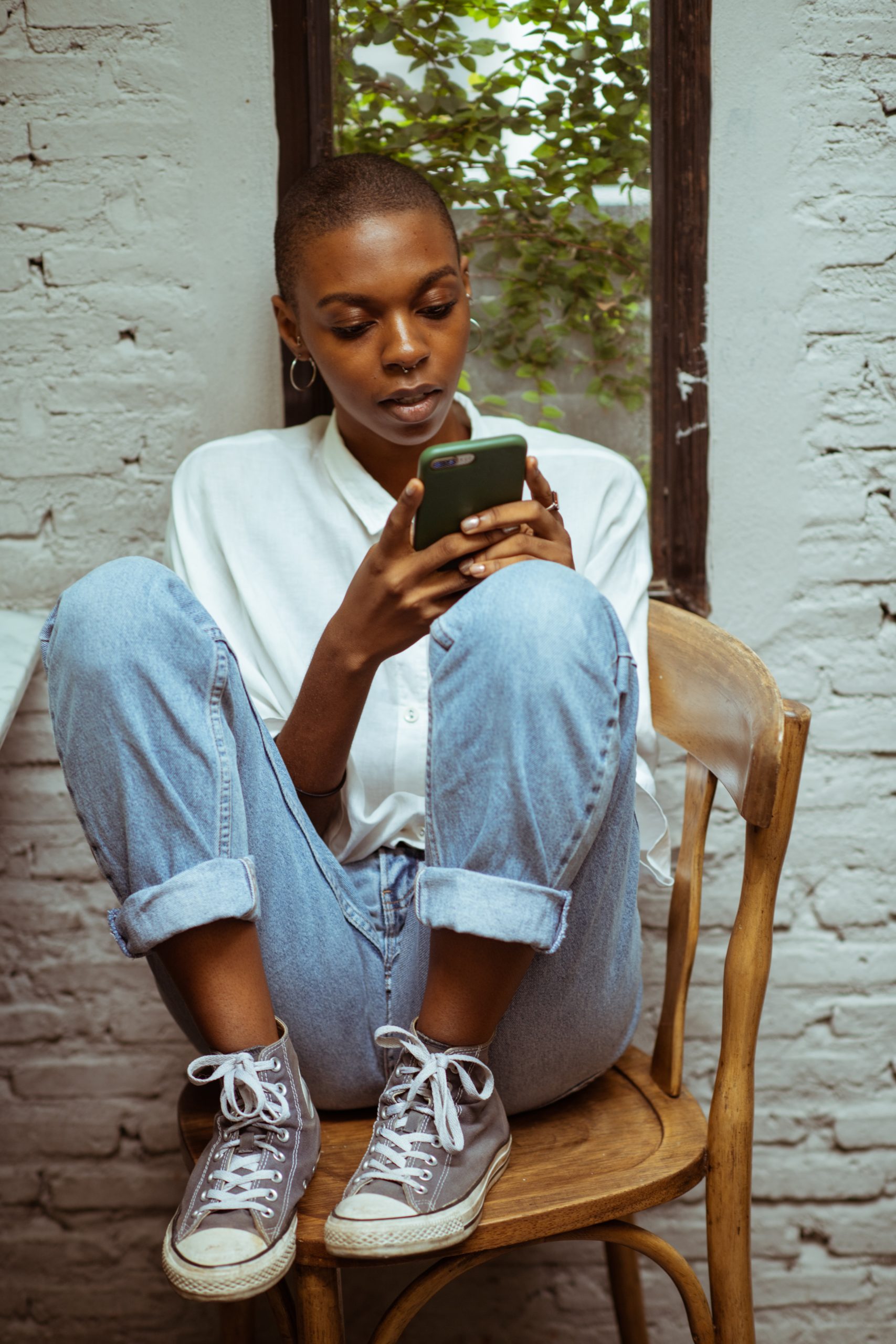 Courtesy of pexels.com - Black Love Woman on phone (Courtesy of pexels.com)