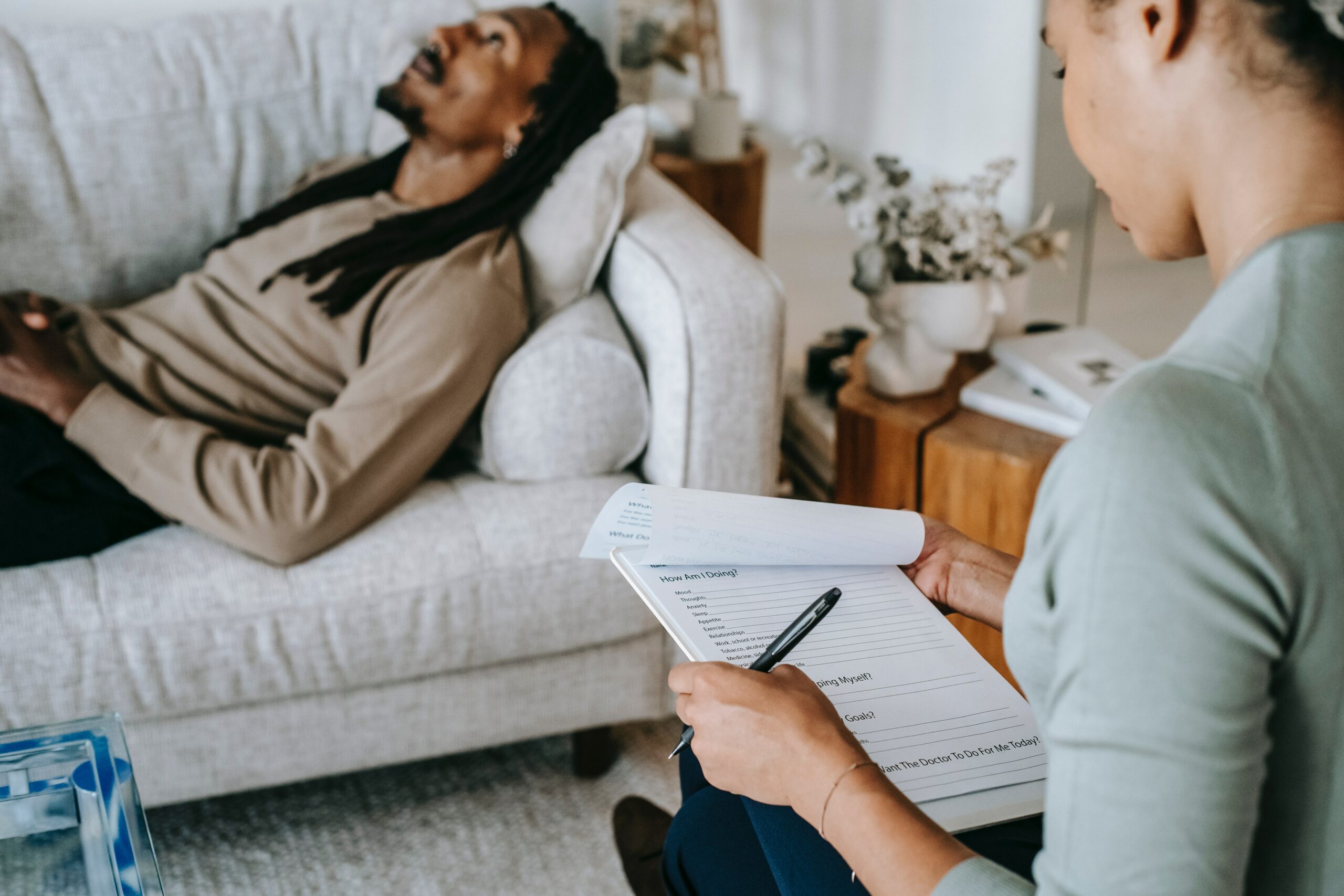Courtesy of pexels.com - Black Love Woman interviewing man in therapy (Courtesy of pexels.com)