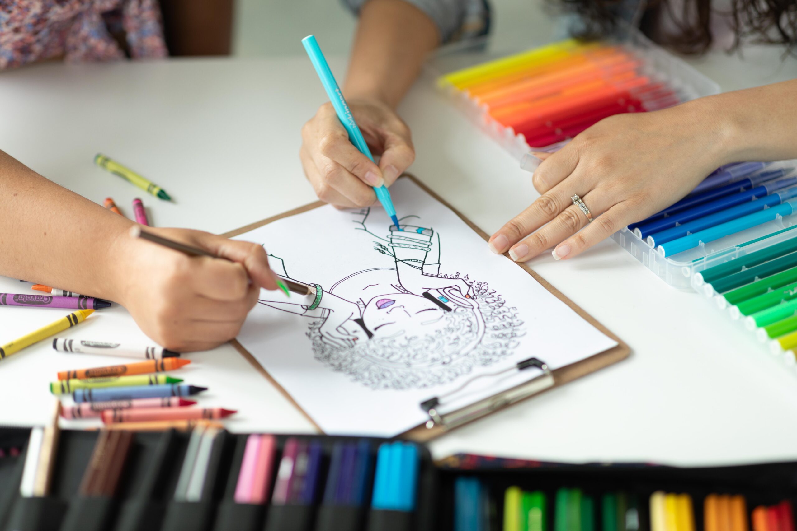 Meet The Two Sisters Filling the Coloring Book Space With Black Curl Magic