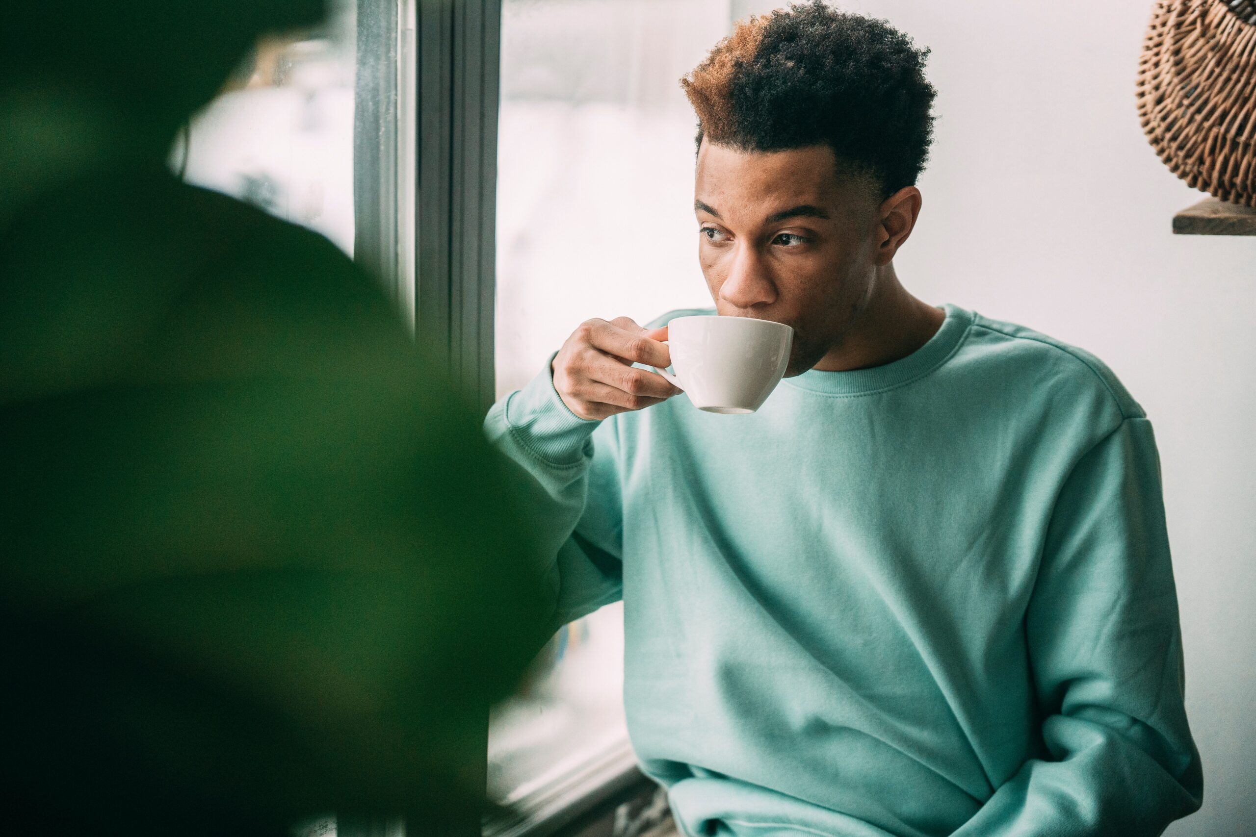Man sipping tea (Courtesy of pexels.com)