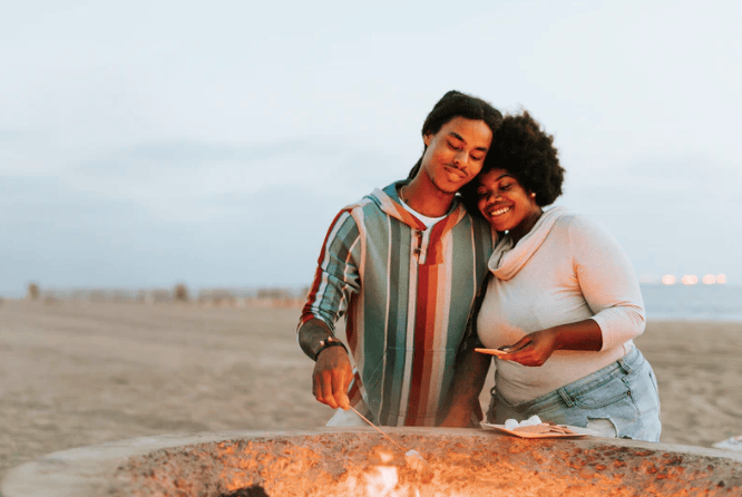 Courtesy of rawpixel.com - Black Love Couple at a fire pit (Courtesy of rawpixel.com)