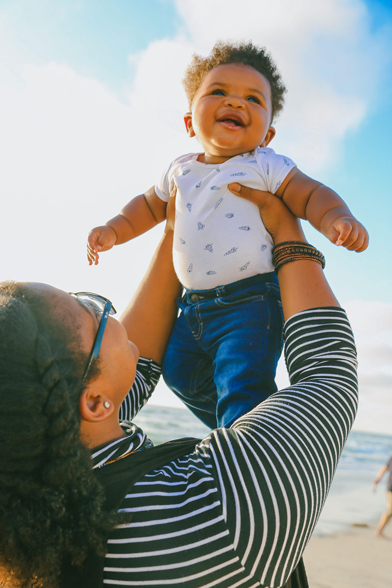 Courtesy of unsplash.com - Black Love Woman holding baby (Courtesy of unsplash.com)