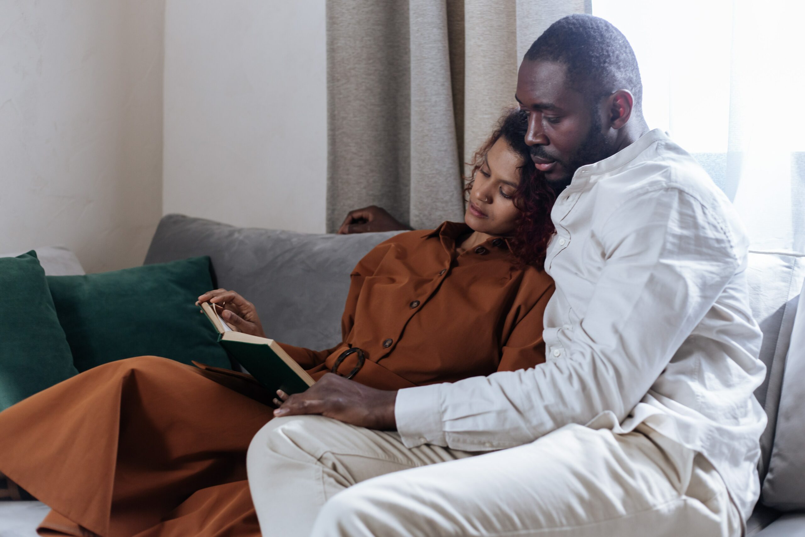 - Black Love Couple reading a book