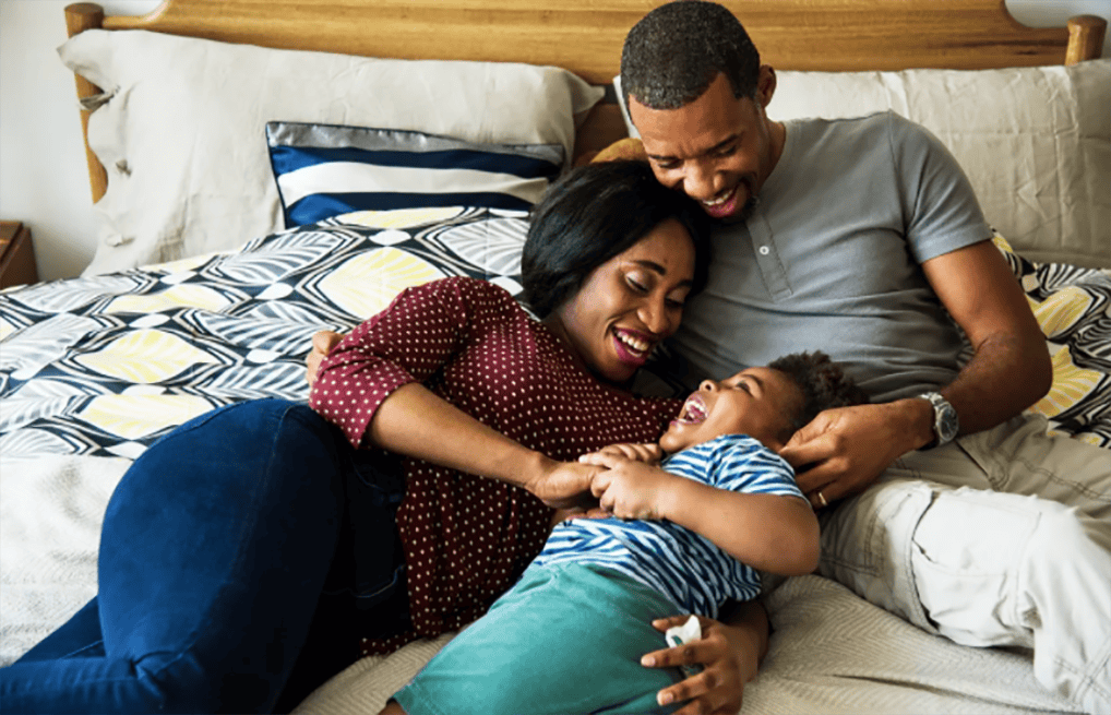 Courtesy of rawpixel.com - Black Love family in bed