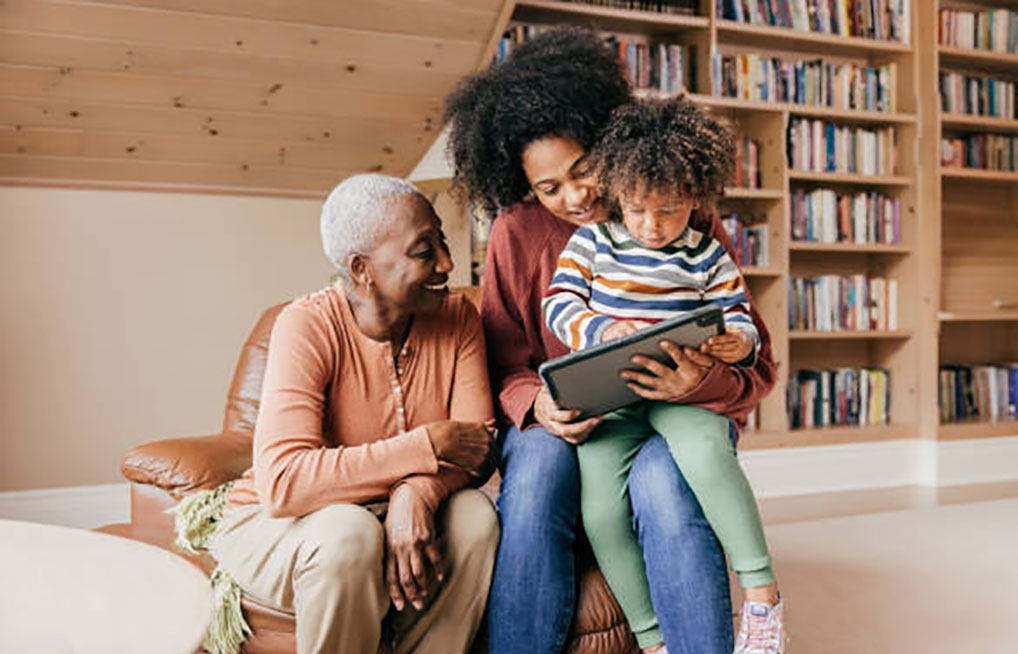 Credit: iStock - Black Love Family on tablet