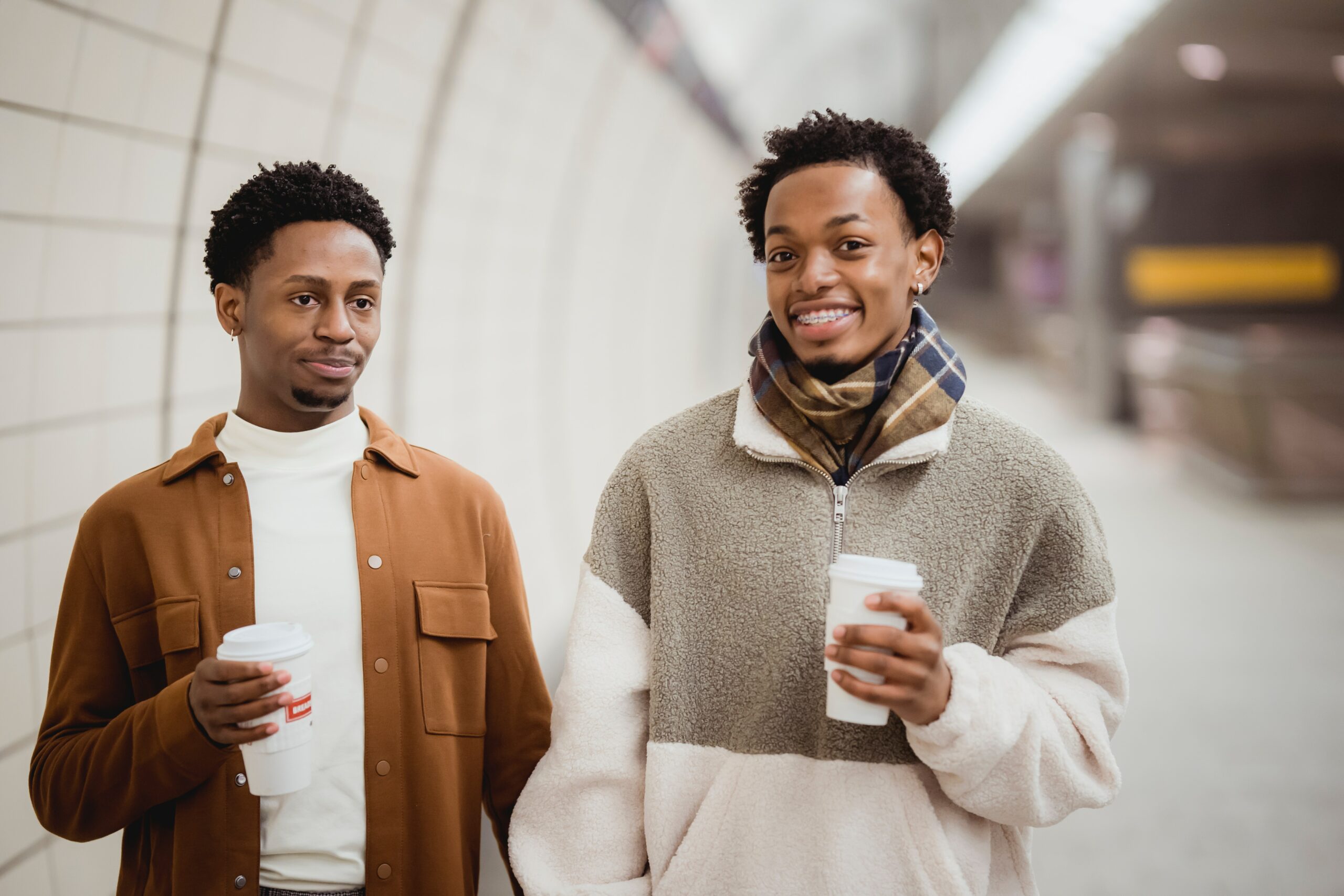 Courtesy of pexels.com - Black Love Couple walking at subway station