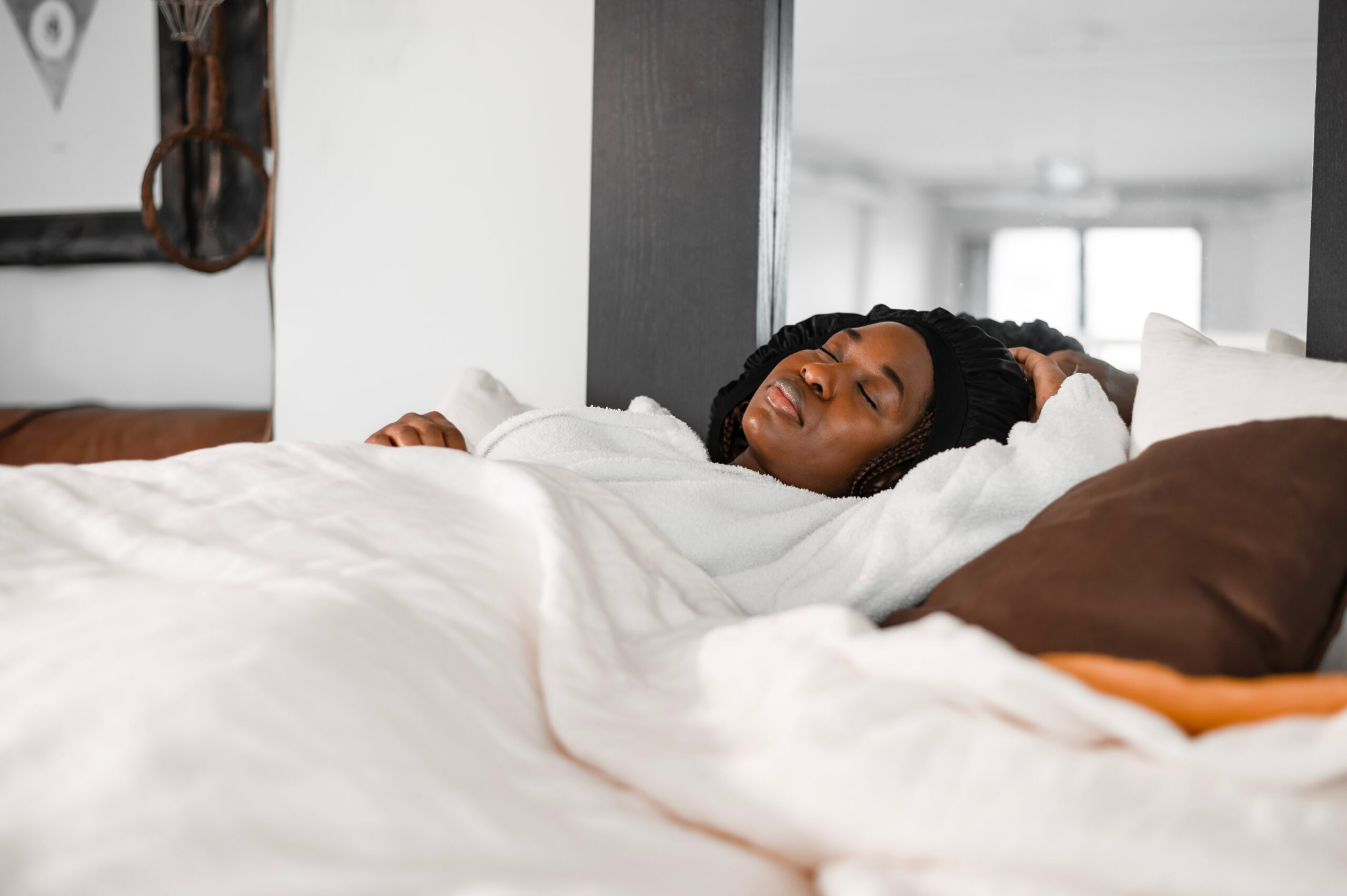 Courtesy of pexels.com - Black Love black woman sleeping in bed