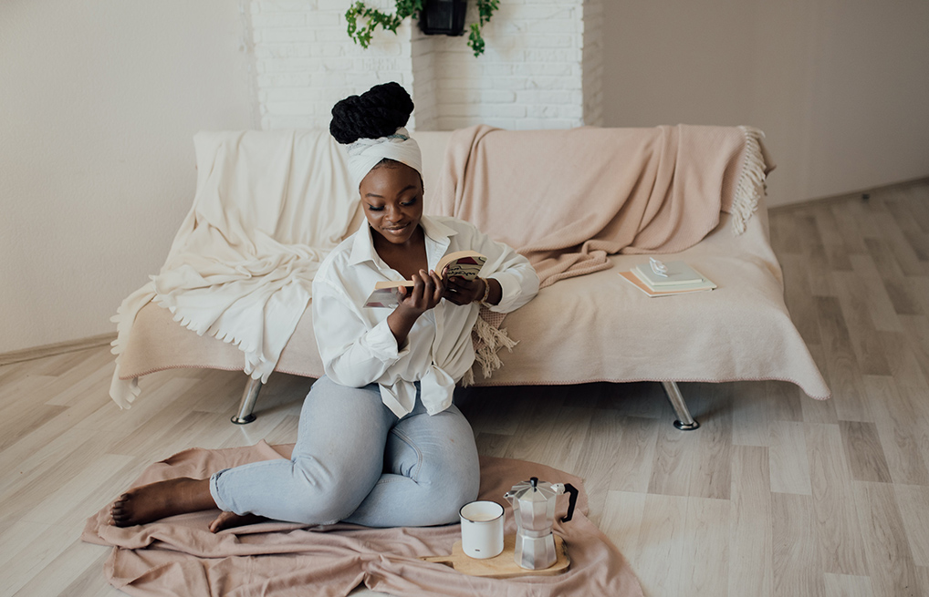 Courtesy of pexels.com - Black Love woman reading book