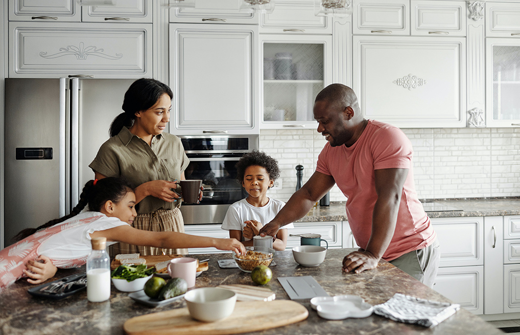 Courtesy of pexels.com - Black Love family in the kitchen making dinner