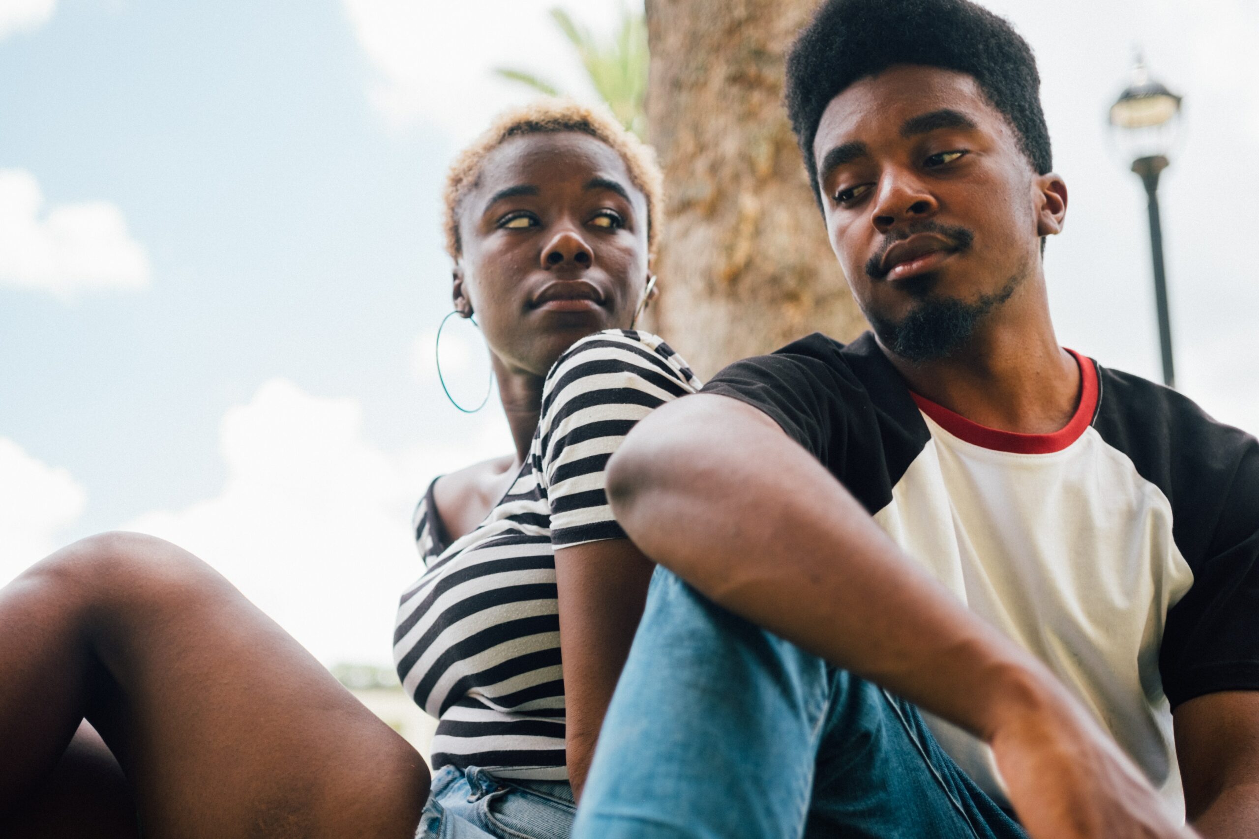 Couple sitting next to each other (Courtesy of pexels.com) - Black Love How Can I Heal From Past Patterns of Trauma in a New Relationship?