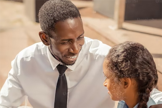Courtesy of unsplash.com - Black Love father talking to daughter
