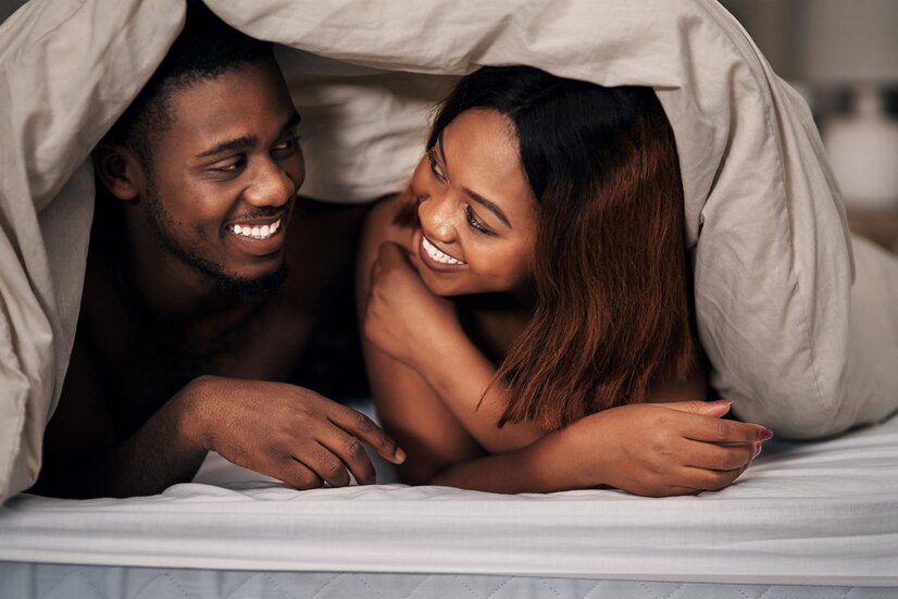 couple under bed sheets (Courtesy of freepik.com) - Black Love