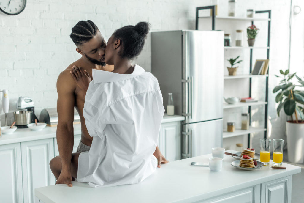 - Black Love Couple Kissing On Kitchen Counter