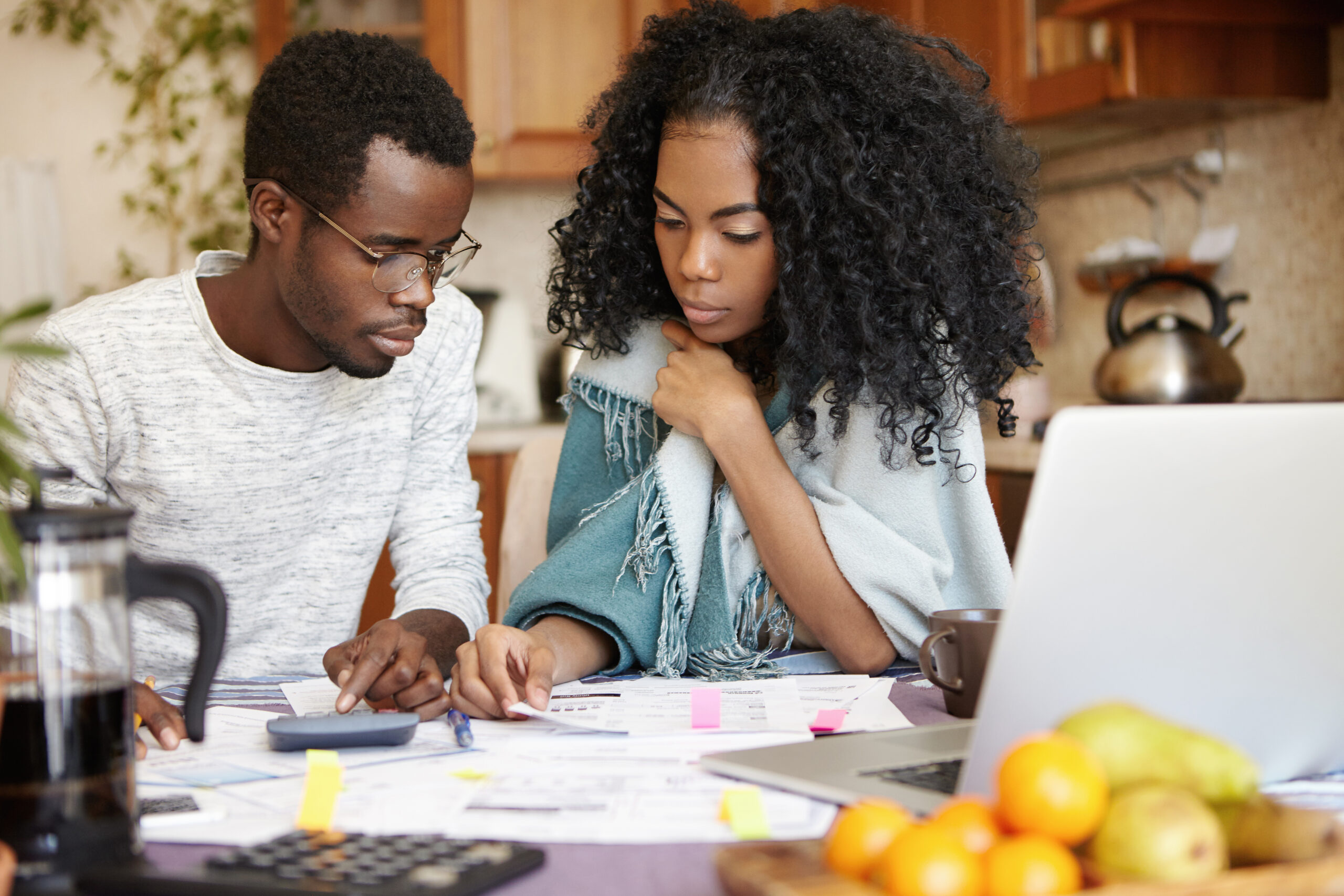 couple looking at finances - Black Love
