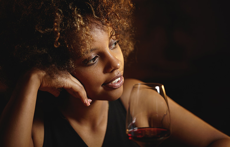 woman with drink (Courtesy of freepik.com) - Black Love
