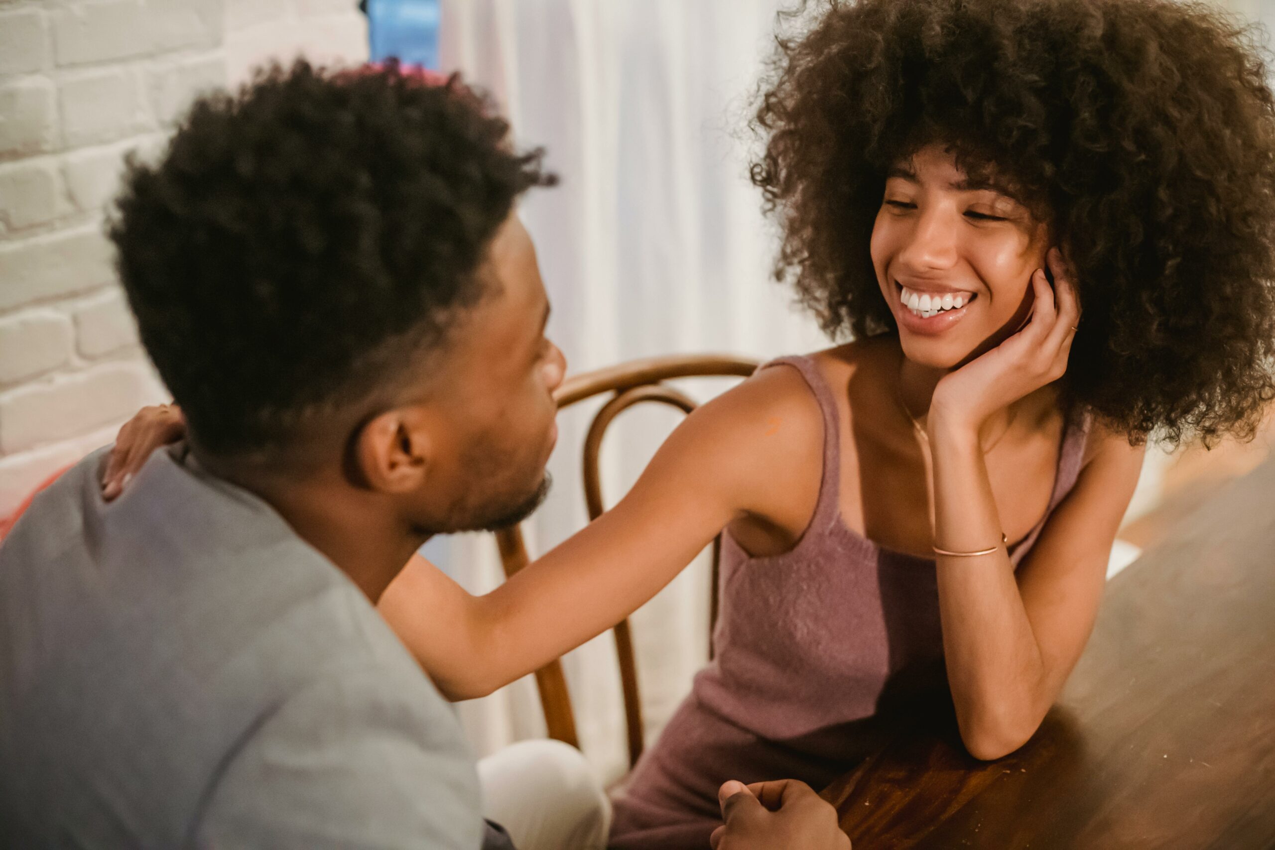 Courtesy of pexels.com - Black Love couple talking