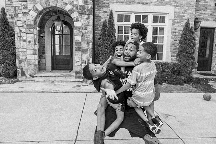 Devale Ellis with his four sons (Photo by Tommy Oliver) - Black Love