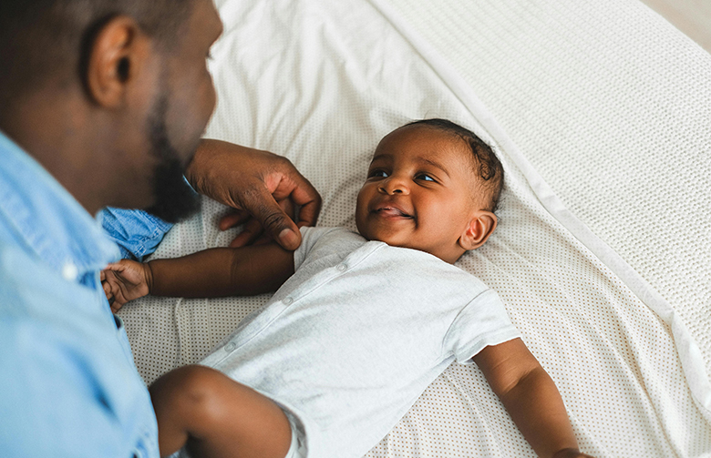 man with baby (Courtesy of pexels.com) - Black Love Embracing Fatherhood as a Young Dad: A Journey of Love and Growth