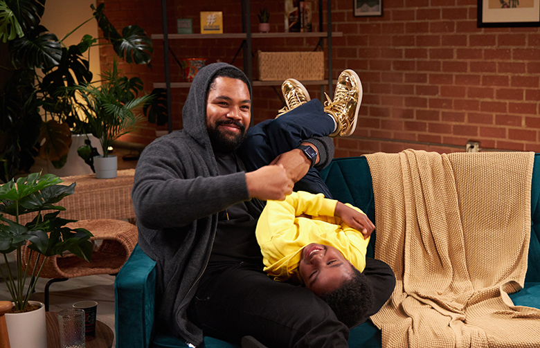 Black Love Co-Founder Tommy Oliver with one of his sons, Brooks - Black Love